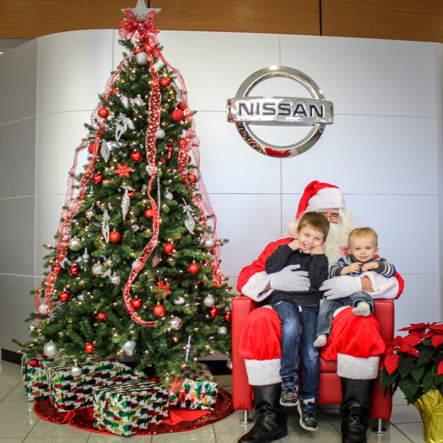 Families enjoying Tri-State Nissan Meet Santa 2018 event