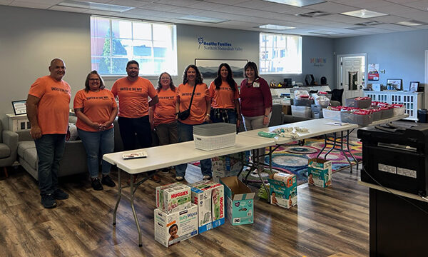 Marlow Auto Group volunteers assembling baby care packages on United Way Day of Caring 2025 (4) - Copy copy