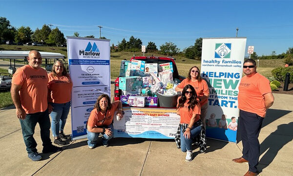 Marlow Auto Group volunteers assembling baby care packages on United Way Day of Caring 2025 (6) - Copy copy