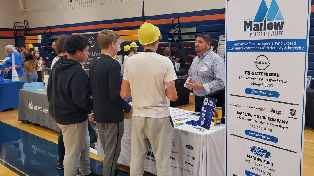 Marlow Auto Group team speaking with students during Clarke County High School Career Fair