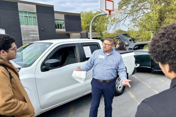 Tri-State Nissan at Level Up Day team teaching seniors about car ownership during Level Up Day at the Innovation Center