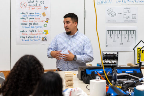 Tri-State Nissan at Level Up Day team teaching seniors about car ownership during Level Up Day at the Innovation Center