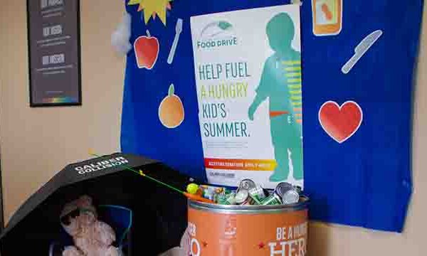 Tri-State Nissan team participating in Caliber Collision Food Drive 2018 donation collection